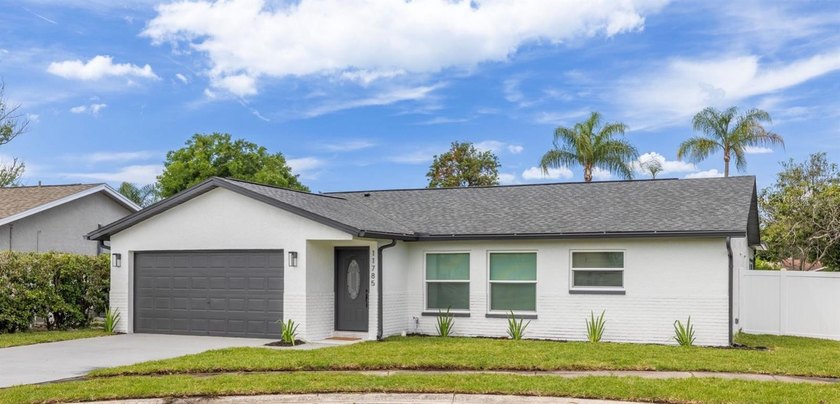 DISCOVER YOUR UPGRADED OASIS 4 beds, 2 baths, 2CG with a POOL - Beach Home for sale in Largo, Florida on Beachhouse.com