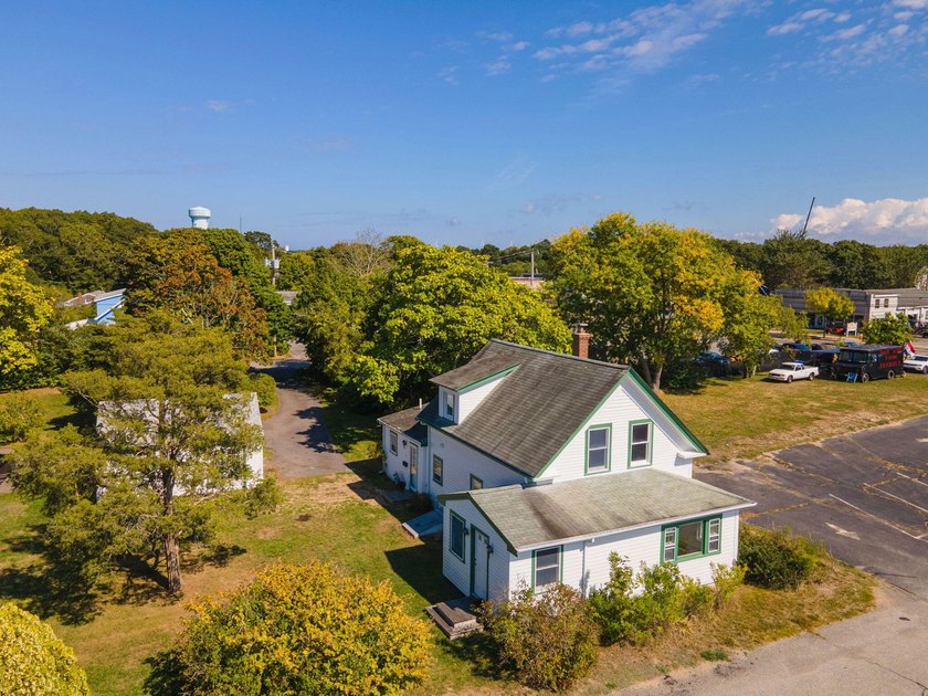 This vintage Colonial with Olde Cape Cod charm offers timeless - Beach Home for sale in Buzzards Bay, Massachusetts on Beachhouse.com