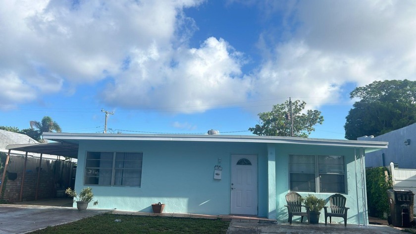 Discover this charming 3-bedroom, 2-bath single-family home on a - Beach Home for sale in West Palm Beach, Florida on Beachhouse.com