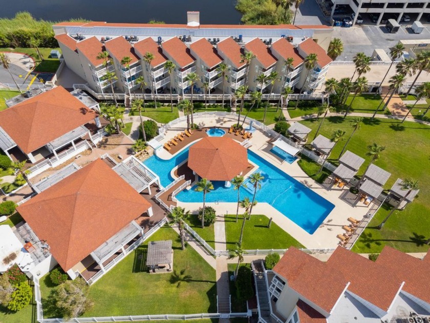 This ground floor unit offers an array of features including 2 - Beach Condo for sale in South Padre Island, Texas on Beachhouse.com