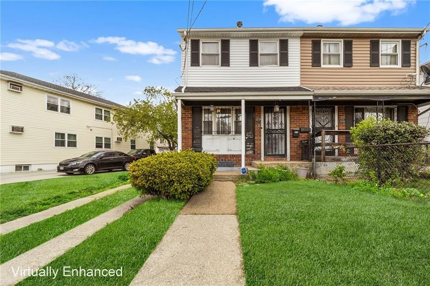 Welcome to 12239 Long Street, a charming semi-detached home in - Beach Home for sale in Jamaica, New York on Beachhouse.com