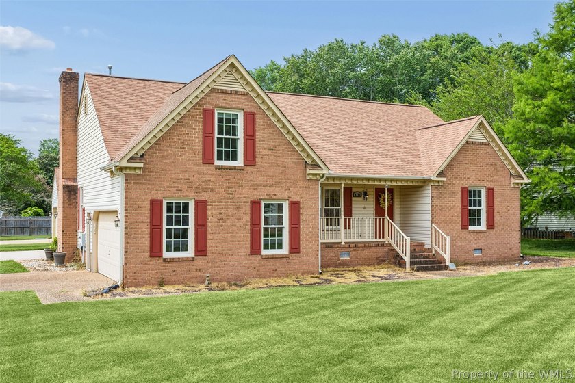 This charming brick home sits on a spacious 0.44-acre corner lot - Beach Home for sale in Williamsburg, Virginia on Beachhouse.com