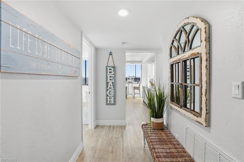 Perched atop the building as a private corner penthouse, this - Beach Condo for sale in Naples, Florida on Beachhouse.com