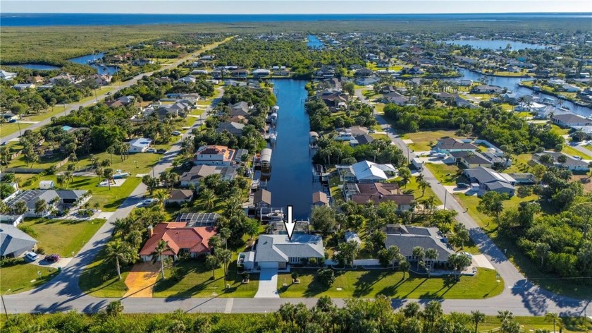 Welcome to your new Home located on 100 ft. of Waterfront. This - Beach Home for sale in Port Charlotte, Florida on Beachhouse.com