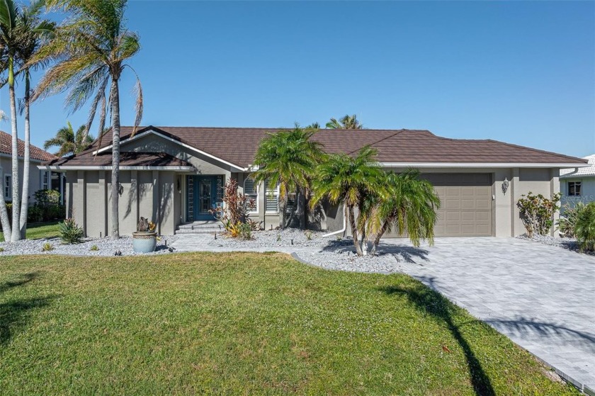 BURNT STORE ISLES WATERFRONT POOL HOME W/**NEW METAL TILE ROOF** - Beach Home for sale in Punta Gorda, Florida on Beachhouse.com