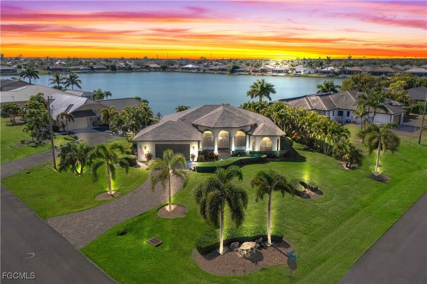 Set against the wide, peaceful backdrop of Seabreeze Lake, this - Beach Home for sale in Cape Coral, Florida on Beachhouse.com