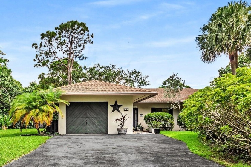 Your Family's Lakeside Haven - Welcome Home.  Nestled on a - Beach Home for sale in Boynton Beach, Florida on Beachhouse.com