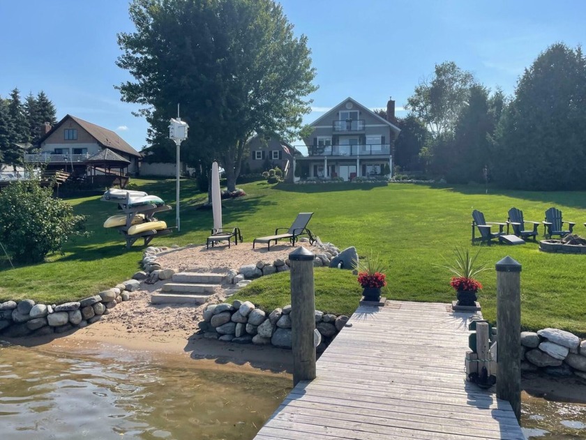 Black River Inland Waterway home on paved road.  Remodeled - Beach Home for sale in Cheboygan, Michigan on Beachhouse.com