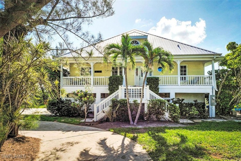 Don't miss the opportunity to own this lovely, raised, *Olde - Beach Home for sale in Sanibel, Florida on Beachhouse.com