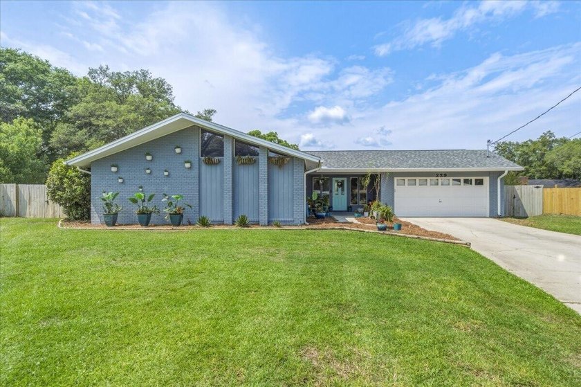 Welcome home! This stunning all-brick residence is tucked away - Beach Home for sale in Fort Walton Beach, Florida on Beachhouse.com