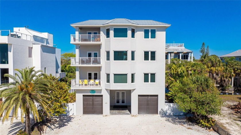 Immerse yourself in the epitome of beachside living with Family - Beach Townhome/Townhouse for sale in Sarasota, Florida on Beachhouse.com