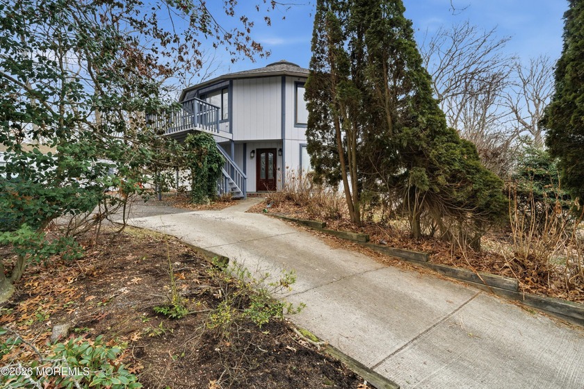 Welcome to this well-maintained 3-bedroom, 3-bath home with a - Beach Home for sale in Little Egg Harbor, New Jersey on Beachhouse.com