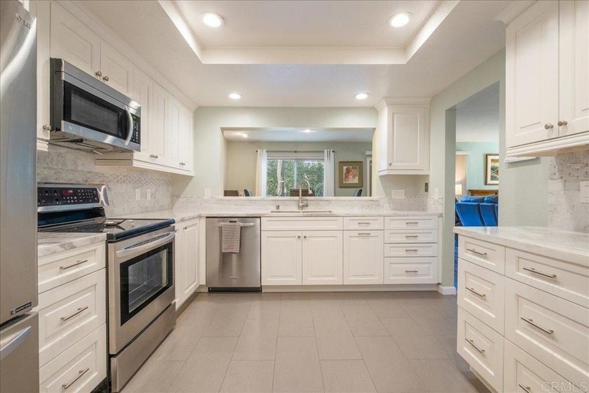 Welcome to 6552 Corte Valdez, a rare end-unit townhome located - Beach Townhome/Townhouse for sale in Carlsbad, California on Beachhouse.com