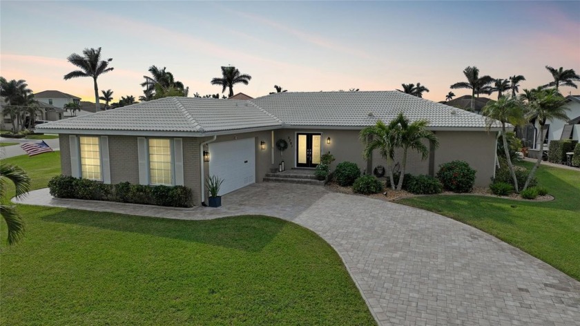 NO HURRICANE DAMAGE! This beautifully remodeled waterfront home - Beach Home for sale in Punta Gorda, Florida on Beachhouse.com