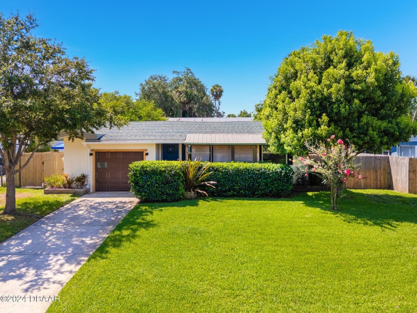 WOW! From the moment you step into this updated well-maintained - Beach Home for sale in Holly Hill, Florida on Beachhouse.com