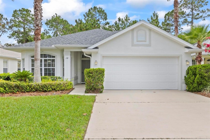 RUSH ON OVER TO THIS REALLY CHARMING HOME ON RAINTREE! EASY - Beach Home for sale in Palm Coast, Florida on Beachhouse.com