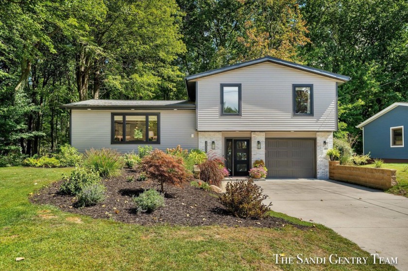 This stunning home underwent a complete top-to-bottom renovation - Beach Home for sale in Grand Haven, Michigan on Beachhouse.com