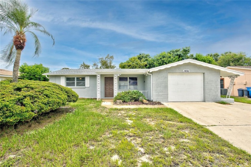 This home, located in Holiday Lake Estates, offers a functional - Beach Home for sale in Holiday, Florida on Beachhouse.com