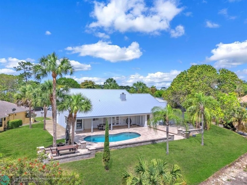 Located in a quiet cul-de-sac, this beautifully upgraded 4-bed - Beach Home for sale in Coral Springs, Florida on Beachhouse.com