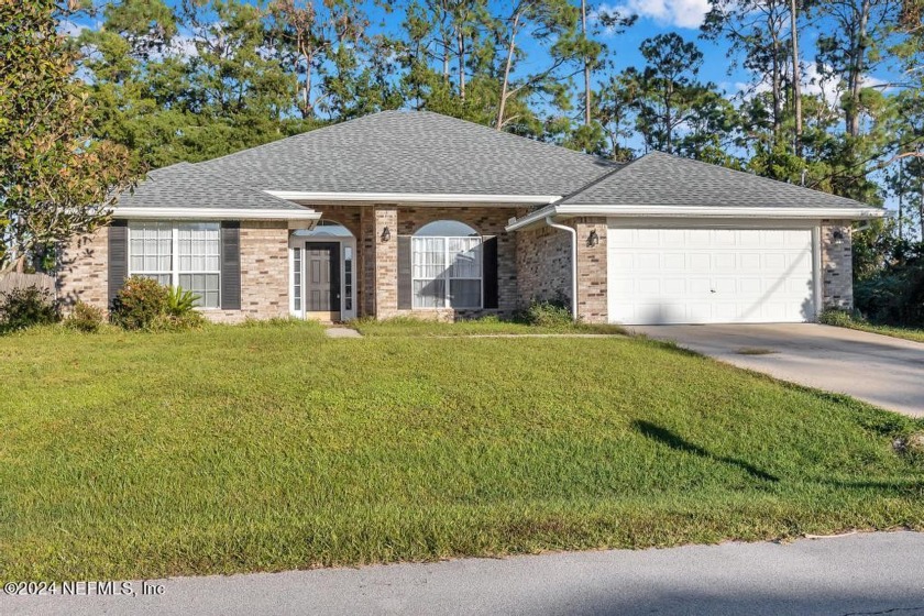 Priced to sell! This exceptional 4BD/2BA home radiates charm & - Beach Home for sale in Palm Coast, Florida on Beachhouse.com