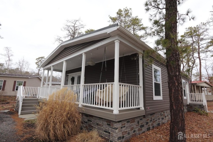 A lovely cottage home, nestled in the forested community of Swan - Beach Home for sale in Galloway, New Jersey on Beachhouse.com