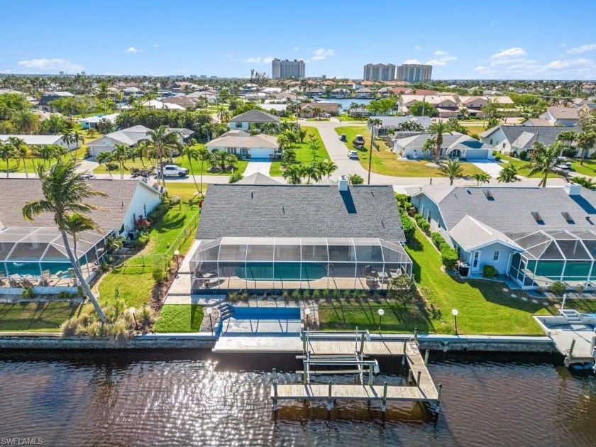 Stunning Canal Front Home in Cape Coral.  Discover your dream - Beach Home for sale in Cape Coral, Florida on Beachhouse.com