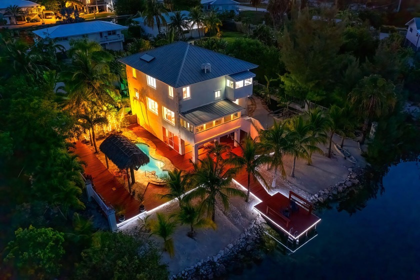 Impressive Luxury Waterfront Tropical Oasis! Located on - Beach Home for sale in Sugarloaf Key, Florida on Beachhouse.com