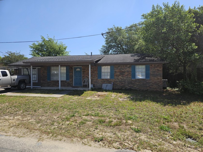 Here's a more casual version: Solid Brick Home in Mary Esther -- - Beach Home for sale in Mary Esther, Florida on Beachhouse.com