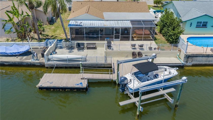 Welcome to your own slice of WATERFRONT PARADISE with DIRECT - Beach Home for sale in Hudson, Florida on Beachhouse.com