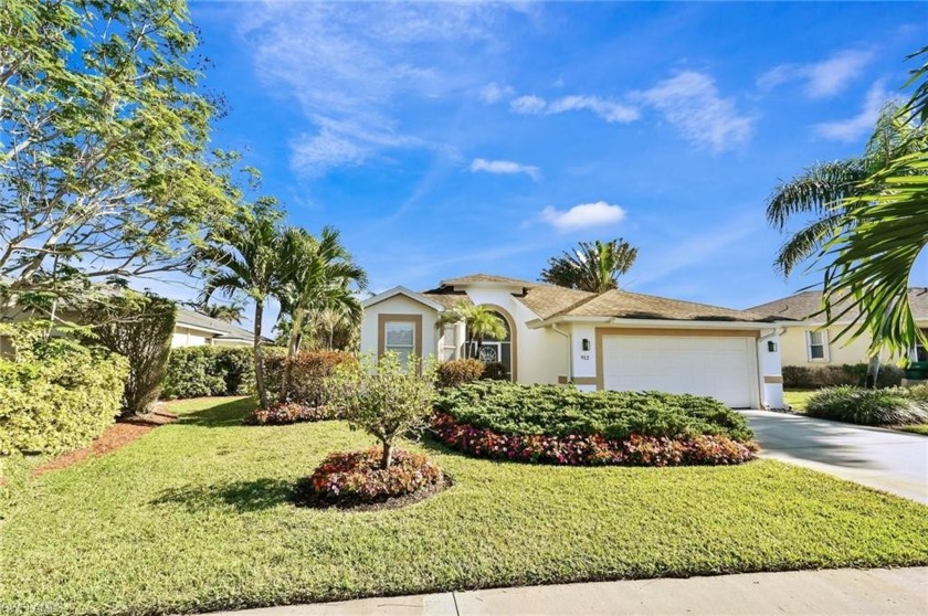 GATED & PET FRIENDLY! Peaceful setting with long lake views from - Beach Home for sale in Naples, Florida on Beachhouse.com