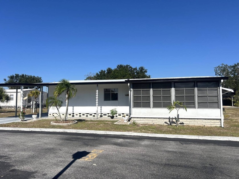 LOOK AT THIS HOME!! SPEND LESS AND GET MORE WITH THIS BEAUTIFUL - Beach Home for sale in Tarpon Springs, Florida on Beachhouse.com