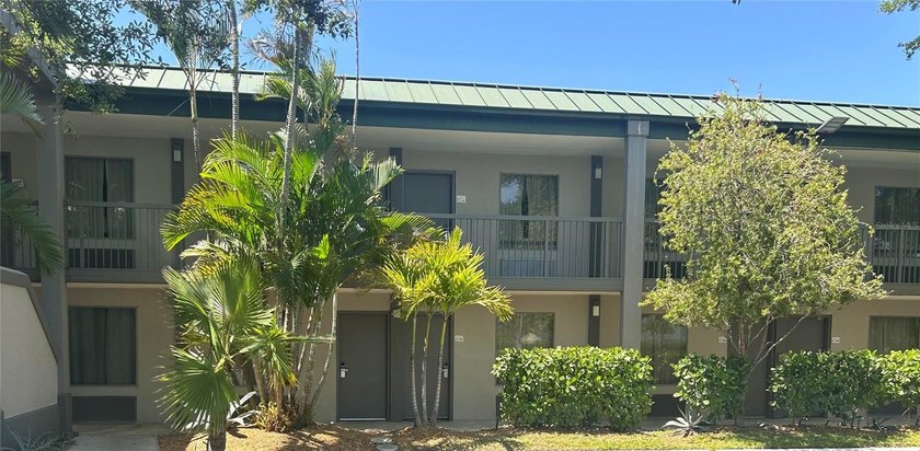 Top-floor unit in the waterfront condo-hotel at the Ramada by - Beach Condo for sale in Sarasota, Florida on Beachhouse.com