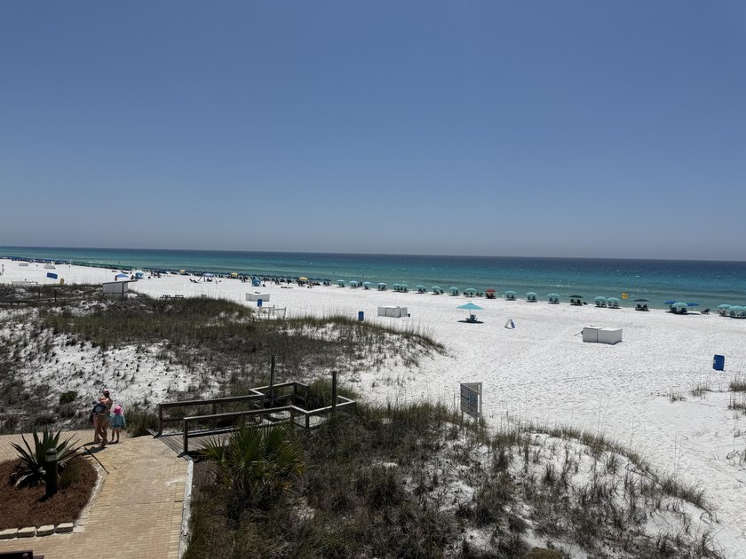 This ground floor unit allows straight to the incredible white - Beach Condo for sale in Destin, Florida on Beachhouse.com