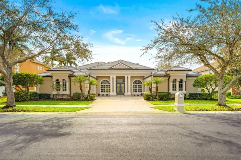 Nestled on picturesque greens of a prestigious golf course, this - Beach Home for sale in Melbourne, Florida on Beachhouse.com