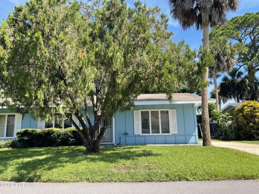 Welcome Home to this quiet and comfortable half duplex in the - Beach Condo for sale in New Smyrna Beach, Florida on Beachhouse.com