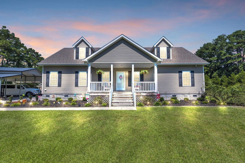 Rarely available, this spacious 5-bedroom, 3-bath home offers - Beach Home for sale in Longs, South Carolina on Beachhouse.com