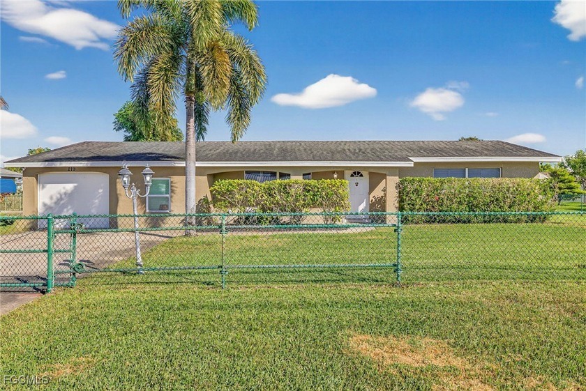 This beautiful 3-bedroom, 2-bath home with a 1-car garage offers - Beach Home for sale in Lehigh Acres, Florida on Beachhouse.com