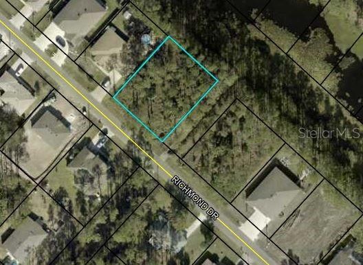 Premium oversized 12,500 sq ft building lot on a very wide canal - Beach Lot for sale in Palm Coast, Florida on Beachhouse.com