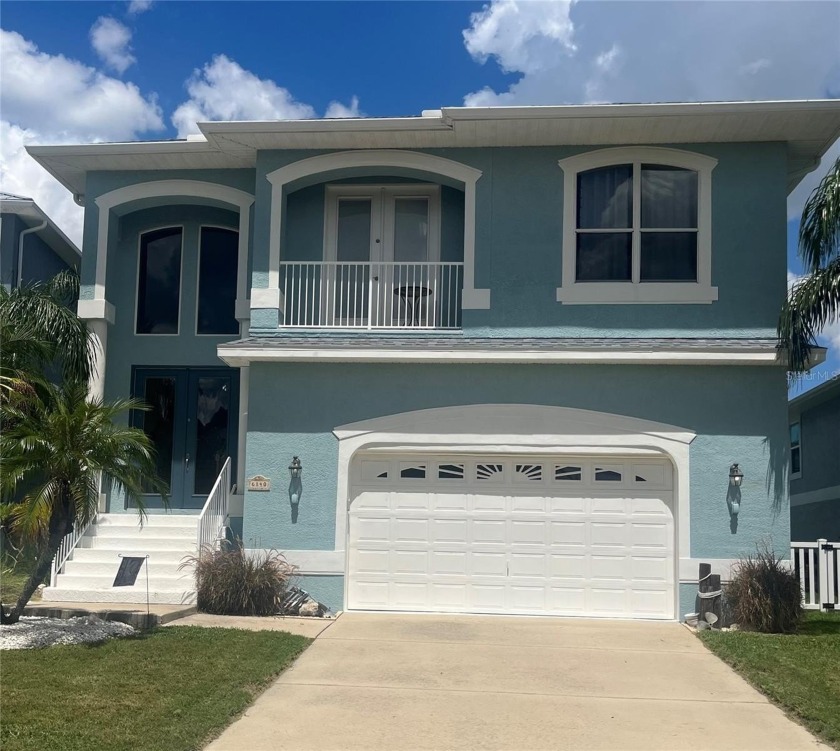 Live the Florida lifestyle in this newer home built in 2005 with - Beach Home for sale in New Port Richey, Florida on Beachhouse.com