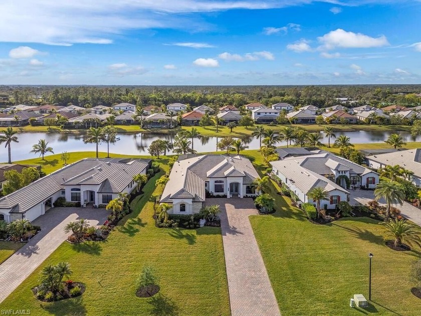 Beautiful lake views and over half an acre of professionally - Beach Home for sale in Naples, Florida on Beachhouse.com