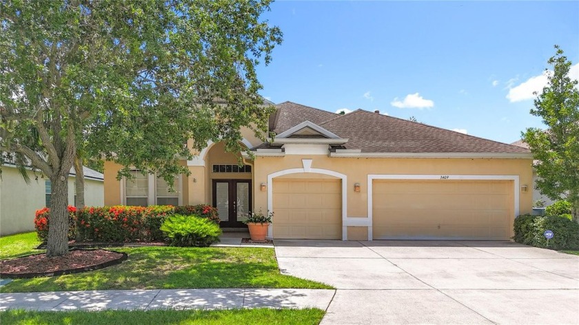 Stunning 4-Bedroom Home on a Spring-Fed Pond with 3-Car Garage - Beach Home for sale in Ellenton, Florida on Beachhouse.com