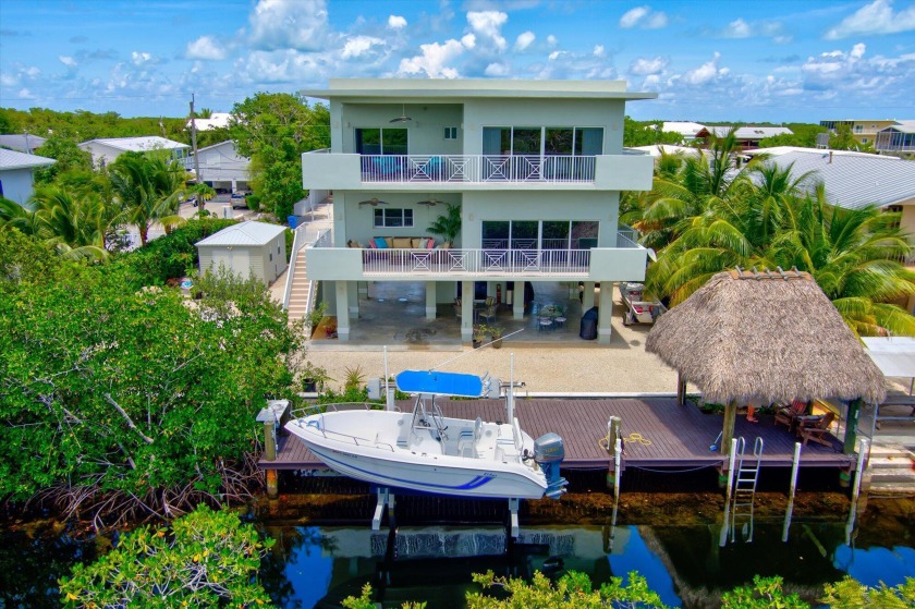 IMMACULATE 4 bedroom, 3 bathroom, deep water canal-front home on - Beach Home for sale in Key Largo, Florida on Beachhouse.com