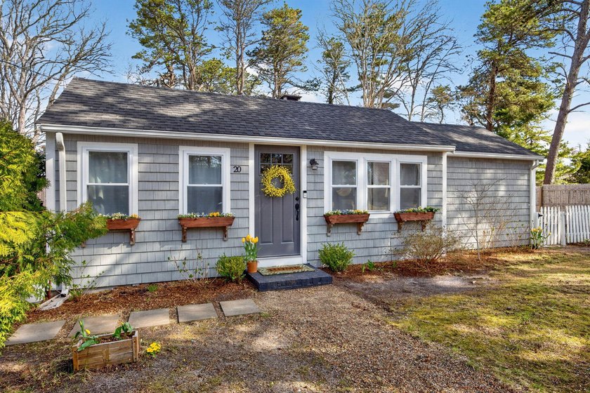 Set near the serene shores of Swan Pond and scenic Swan River - Beach Home for sale in Dennis Port, Massachusetts on Beachhouse.com