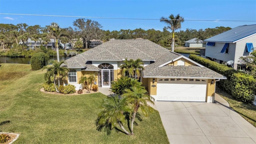 Welcome to 1070 March Dr, a breathtaking 3-bedroom, 2-bathroom - Beach Home for sale in Port Charlotte, Florida on Beachhouse.com