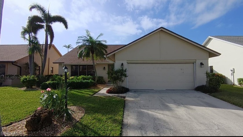 Boasting two large family rooms, this beautifully remodeled home - Beach Home for sale in Fort Myers, Florida on Beachhouse.com