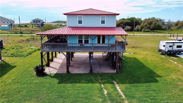 Embrace coastal living with this charming Rustic Beach Cottage - Beach Home for sale in Cameron, Louisiana on Beachhouse.com