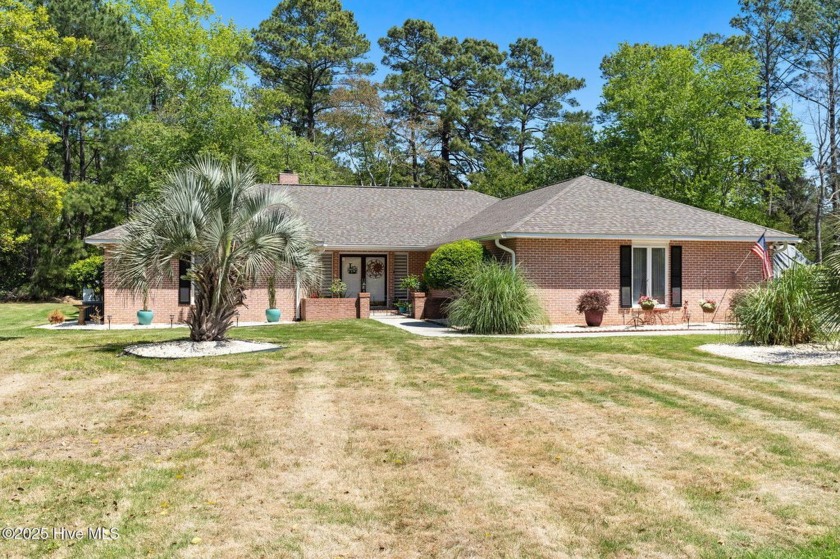 Welcome to a rare gem where luxury meets lifestyle--with no HOA! - Beach Home for sale in Shallotte, North Carolina on Beachhouse.com