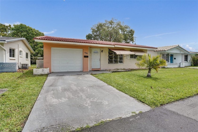 Waiting for your personal touches, this charming home is located - Beach Home for sale in Tamarac, Florida on Beachhouse.com