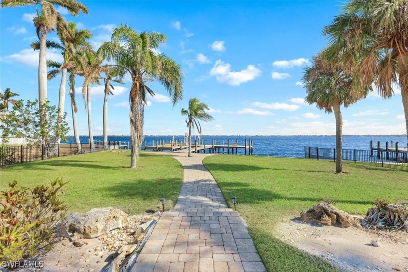 RARE!  Wide Riverfront View Pool Home in the Yacht Club on an - Beach Home for sale in Cape Coral, Florida on Beachhouse.com