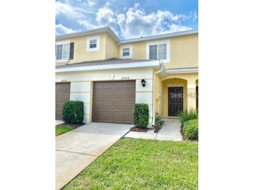 Explore this immaculate townhome that boasts an open-concept - Beach Townhome/Townhouse for sale in Tampa, Florida on Beachhouse.com